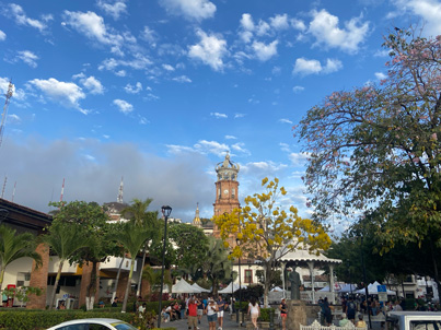 Plaza de Armas with people and tents in Puerto Vallarta, Mexico