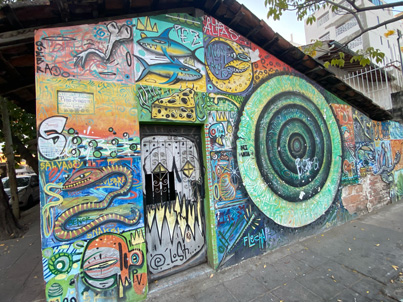 A building with graffiti on Puerto Vallarta street art walk