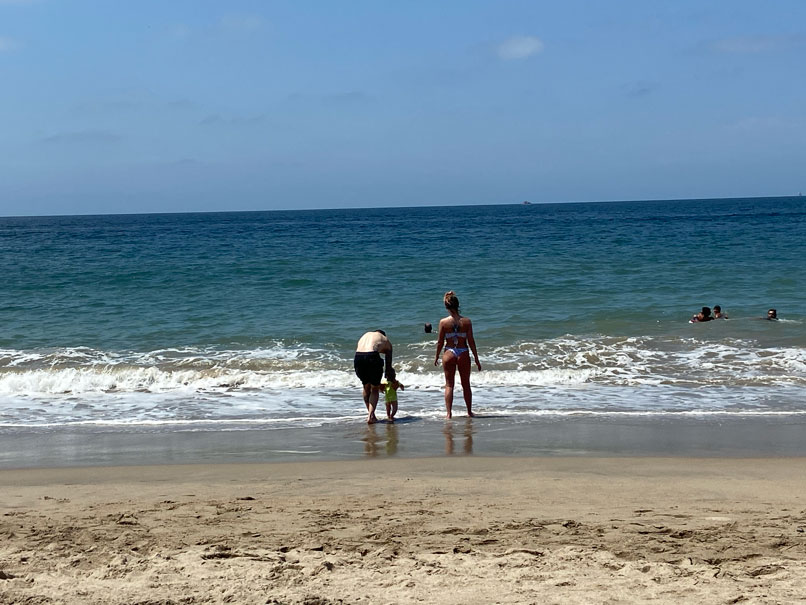 Man and woman on Los Muertos beach Puerto Vallarta Mexico