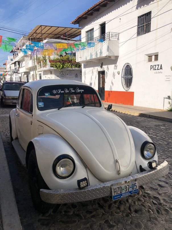 A white Volkswagen bug in Puerto Vallarta, Mexico