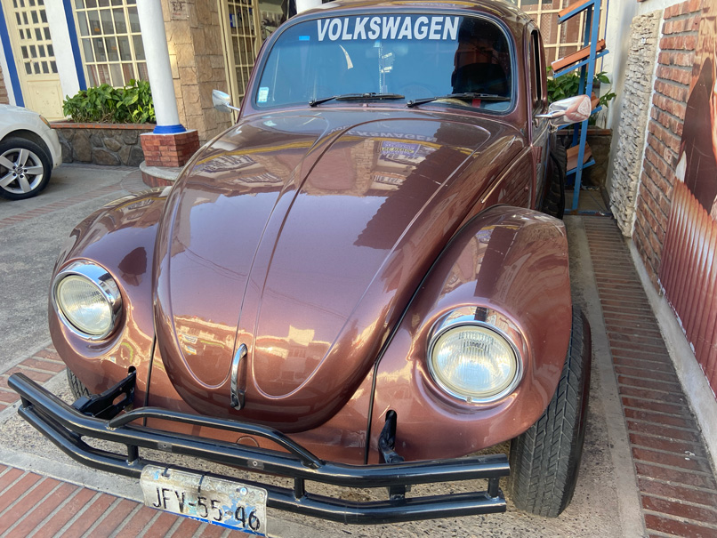 A brown Volkswagen beetle in Puerto Vallarta, Mexico